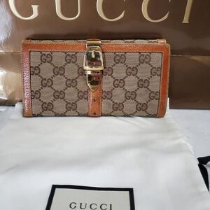 Gucci GG Logo Continental Canvas Tan Bifold Wallet with Leather Trim. 1462012778